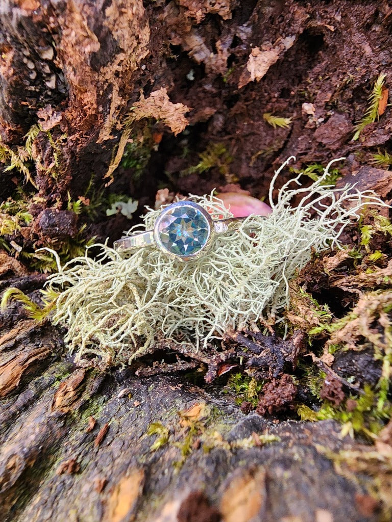 blue single solitaire set ring with silver band
