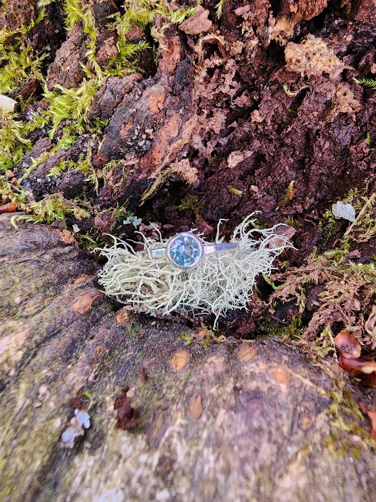 blue single solitaire set ring with silver band