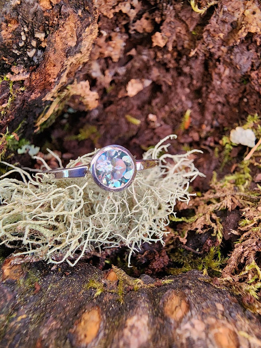 blue single solitaire set ring with silver band