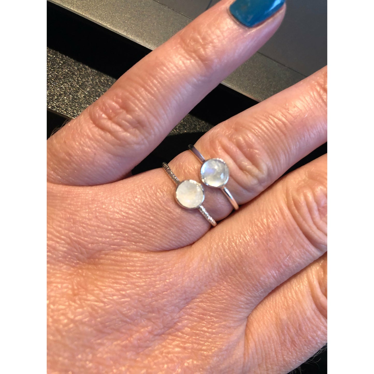 small moonstone ring with simple band. Bezel set.