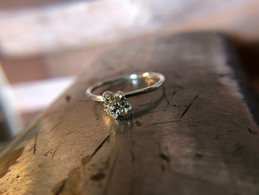 Small single band ring with raw pyrite prong set