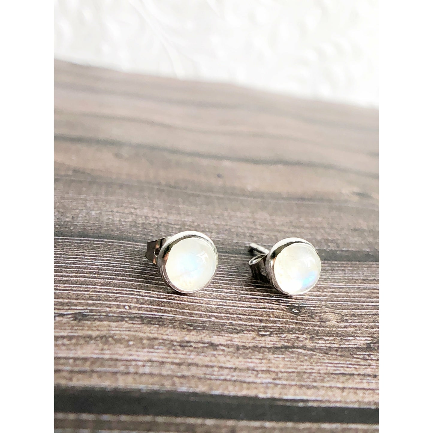 Simple moonstone (clear with blue lines) sterling silver bezel earrings