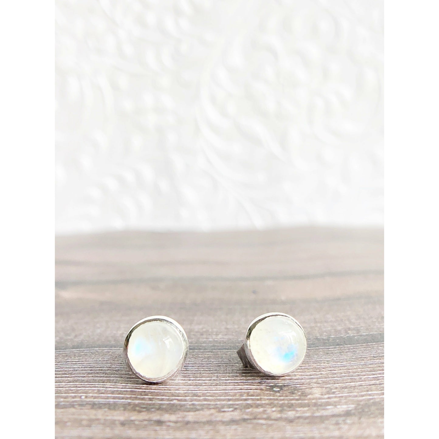 Simple moonstone (clear with blue lines) sterling silver bezel earrings
