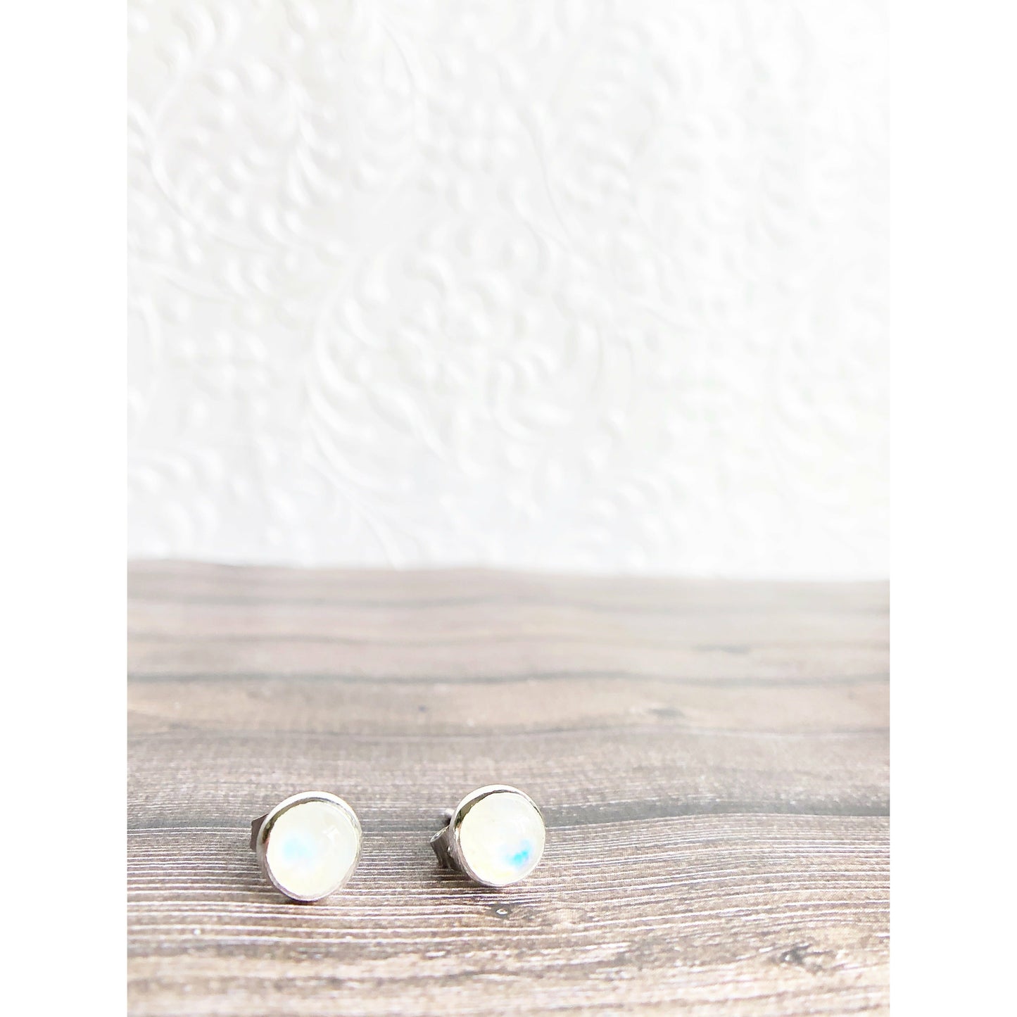 Simple moonstone (clear with blue lines) sterling silver bezel earrings