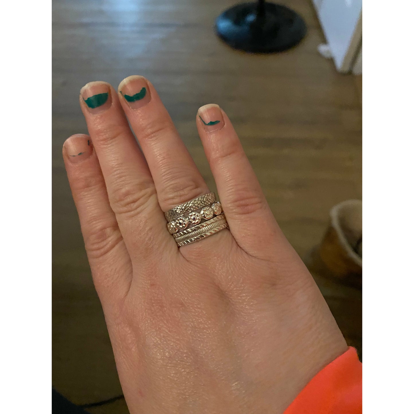 three different band to layer together, top band is snakeskins print, middle band is flowers, bottom is braided silver