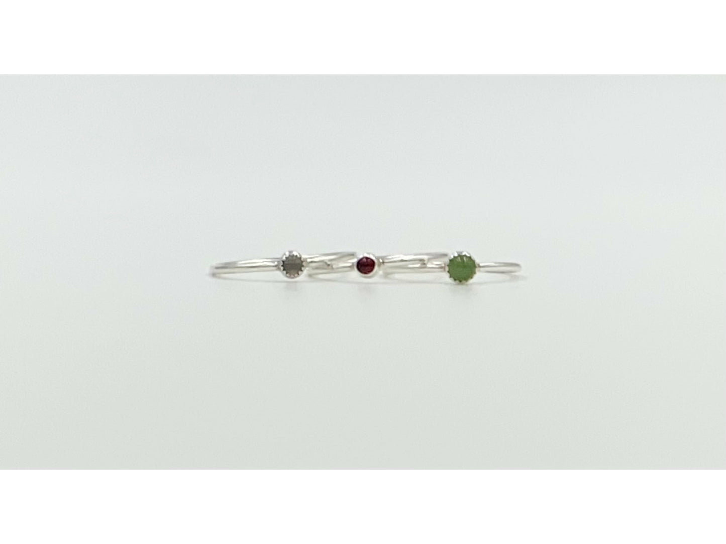 Small stackable ring mounted on a round wire. Your choice of stone.