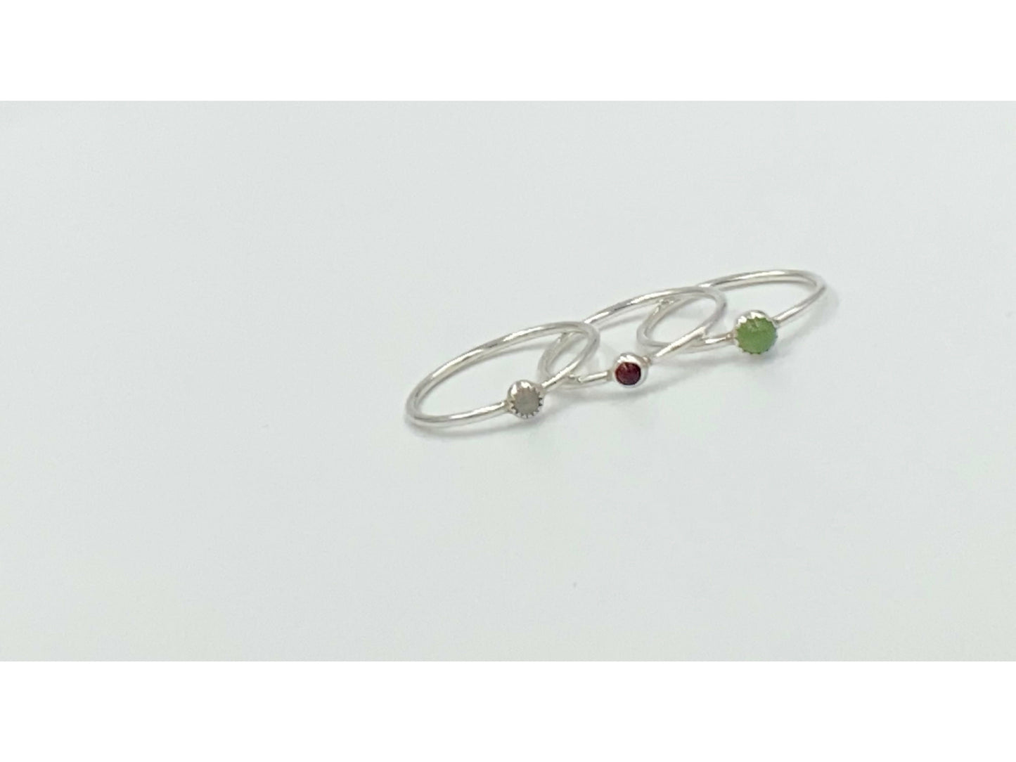 Small stackable ring mounted on a round wire. Your choice of stone.