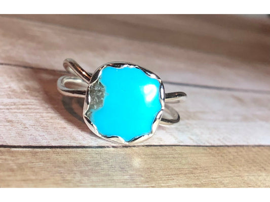 Small turquoise ring with square shaped stone.