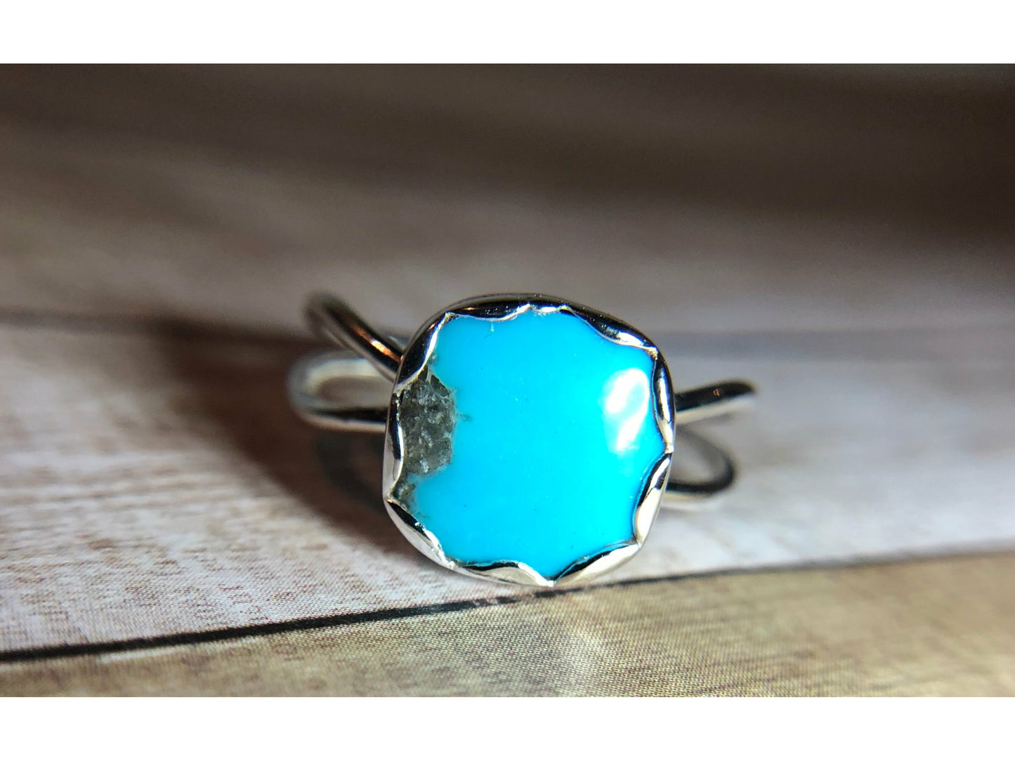 Small turquoise ring with square shaped stone.