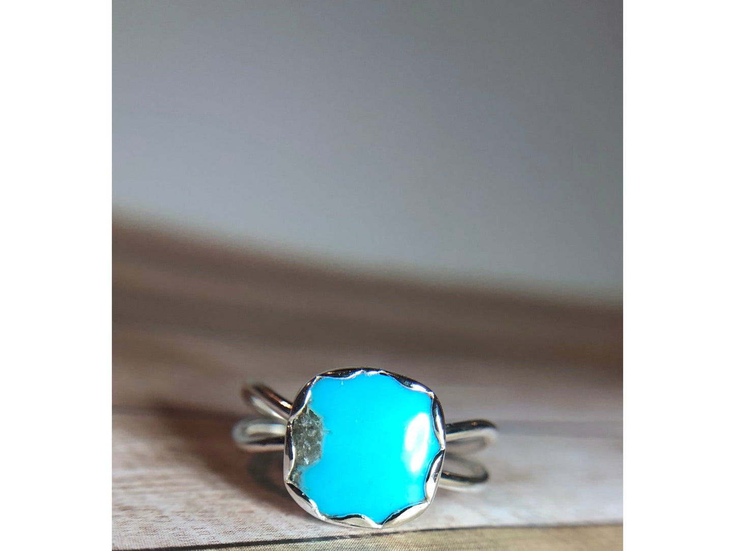 Small turquoise ring with square shaped stone.