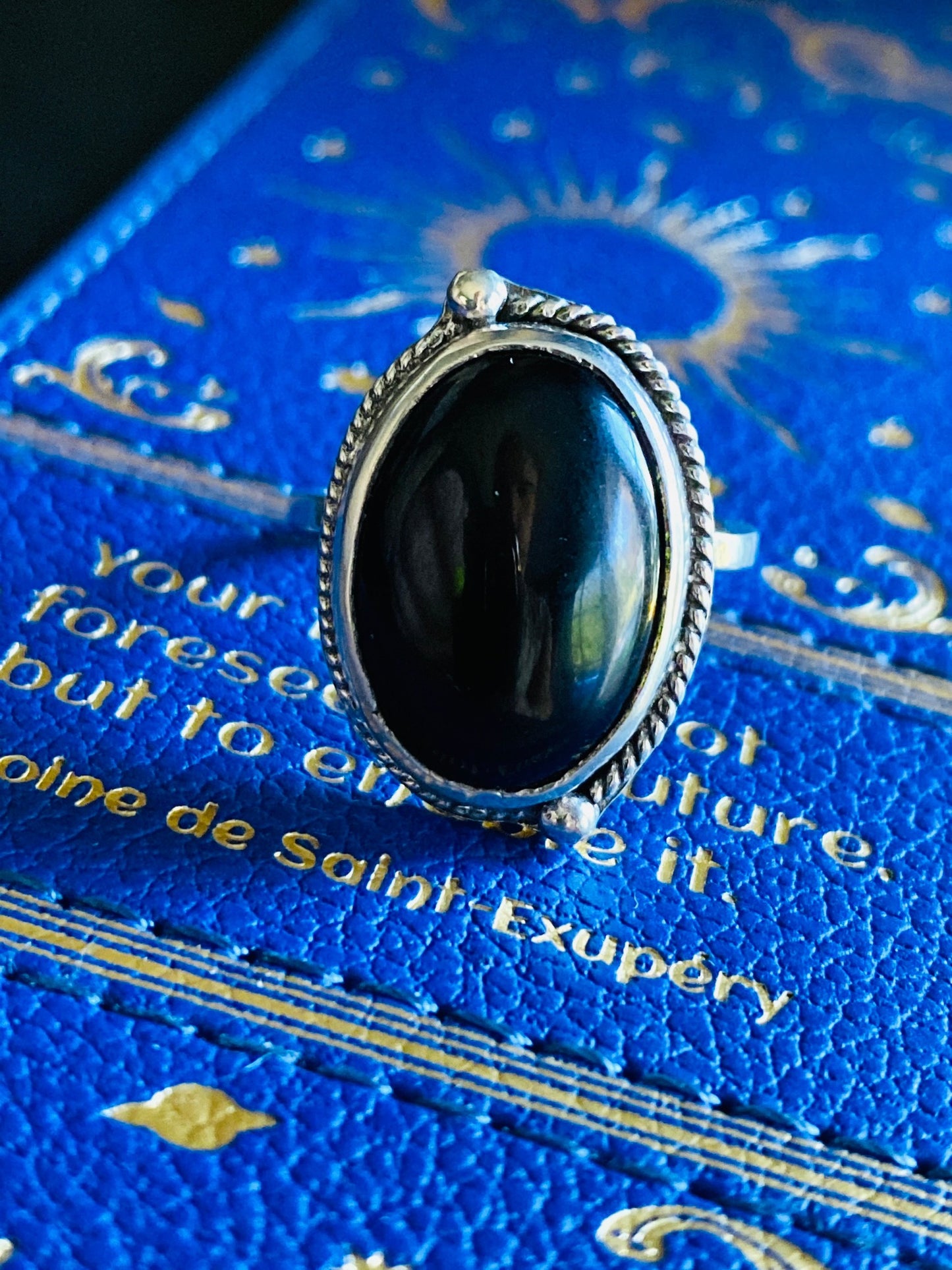 sterling silver onyx statement ring, onyx cabachon with half twisted wire with granulation (tiny dots) offset, statement ring, simple band