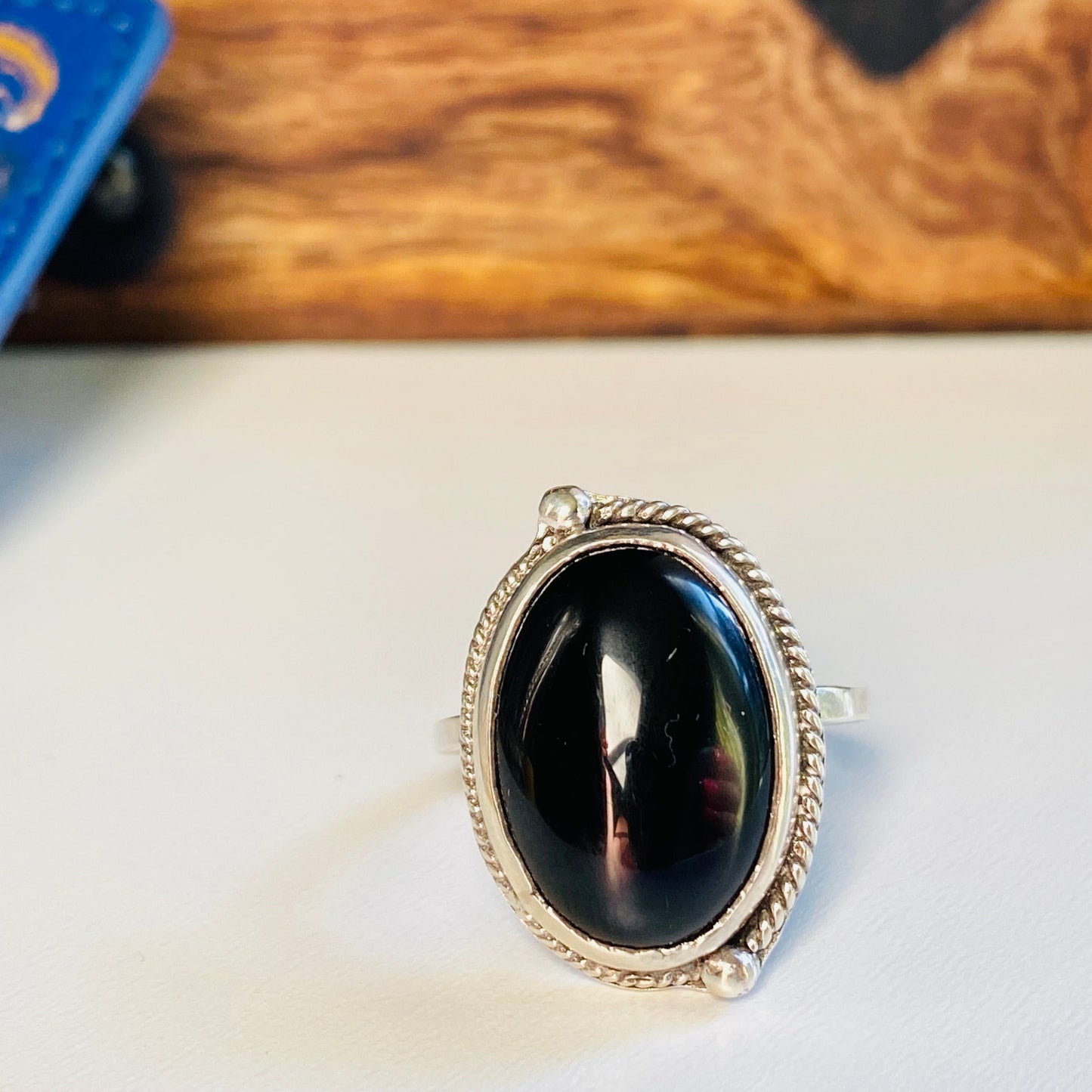 sterling silver onyx statement ring, onyx cabachon with half twisted wire with granulation (tiny dots) offset, statement ring, simple band