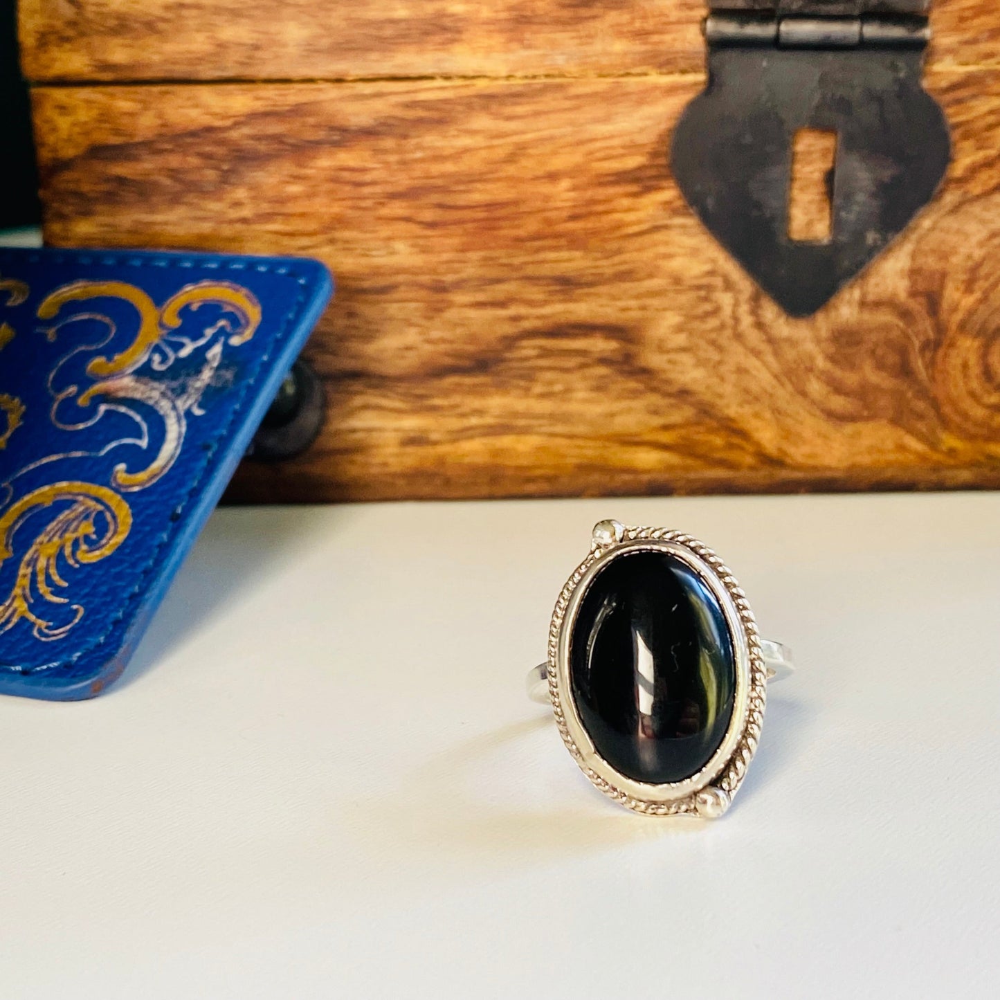 sterling silver onyx statement ring, onyx cabachon with half twisted wire with granulation (tiny dots) offset, statement ring, simple band