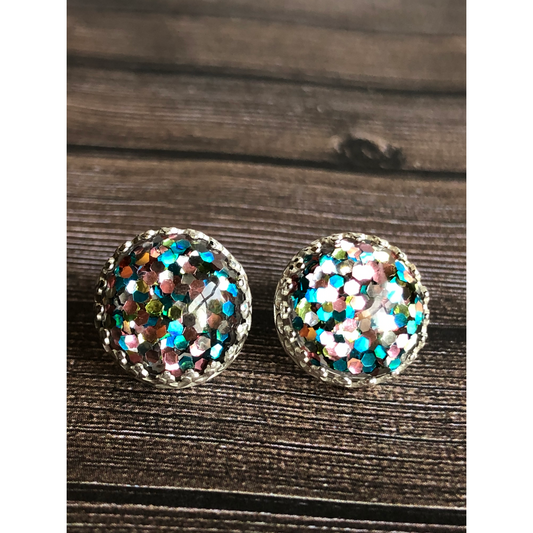 10mm resin stone with glitter susupended in it, mounted on open back bezels top post not center post