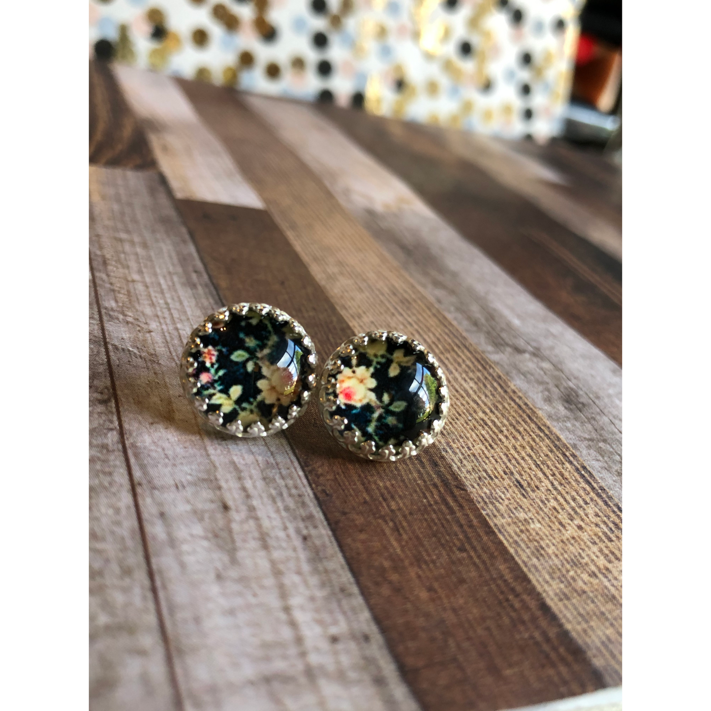 10mm resin black stones with tiny flower pattern in the stone, open back bezel top post not center post