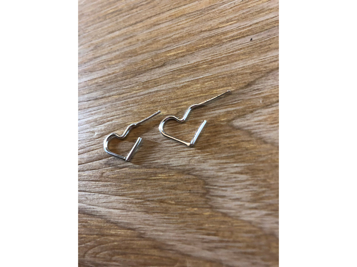 silver wire makes a heart shape