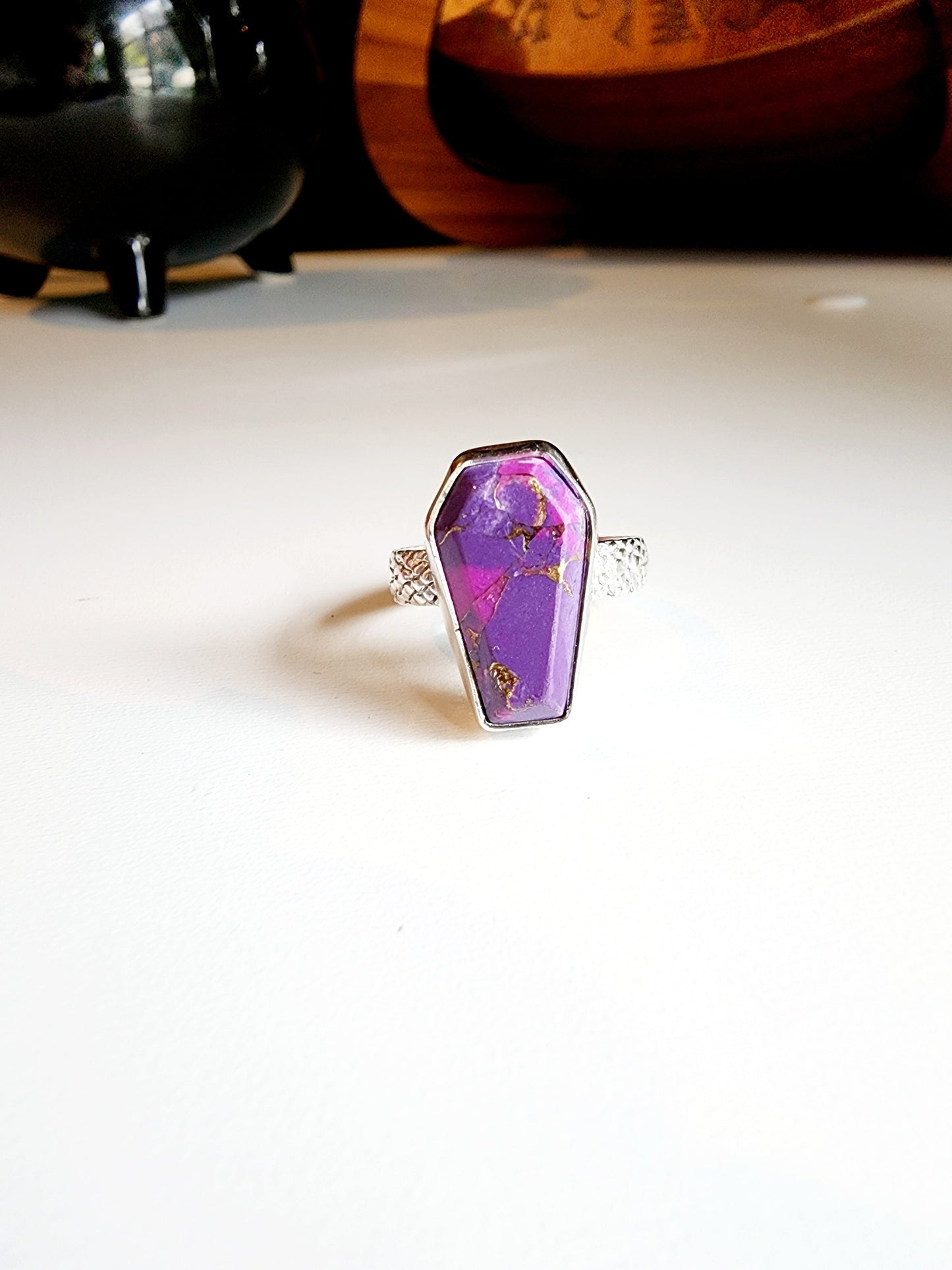 Purple with gold speckled coffin stone shaped ring with snakeskin like textured band