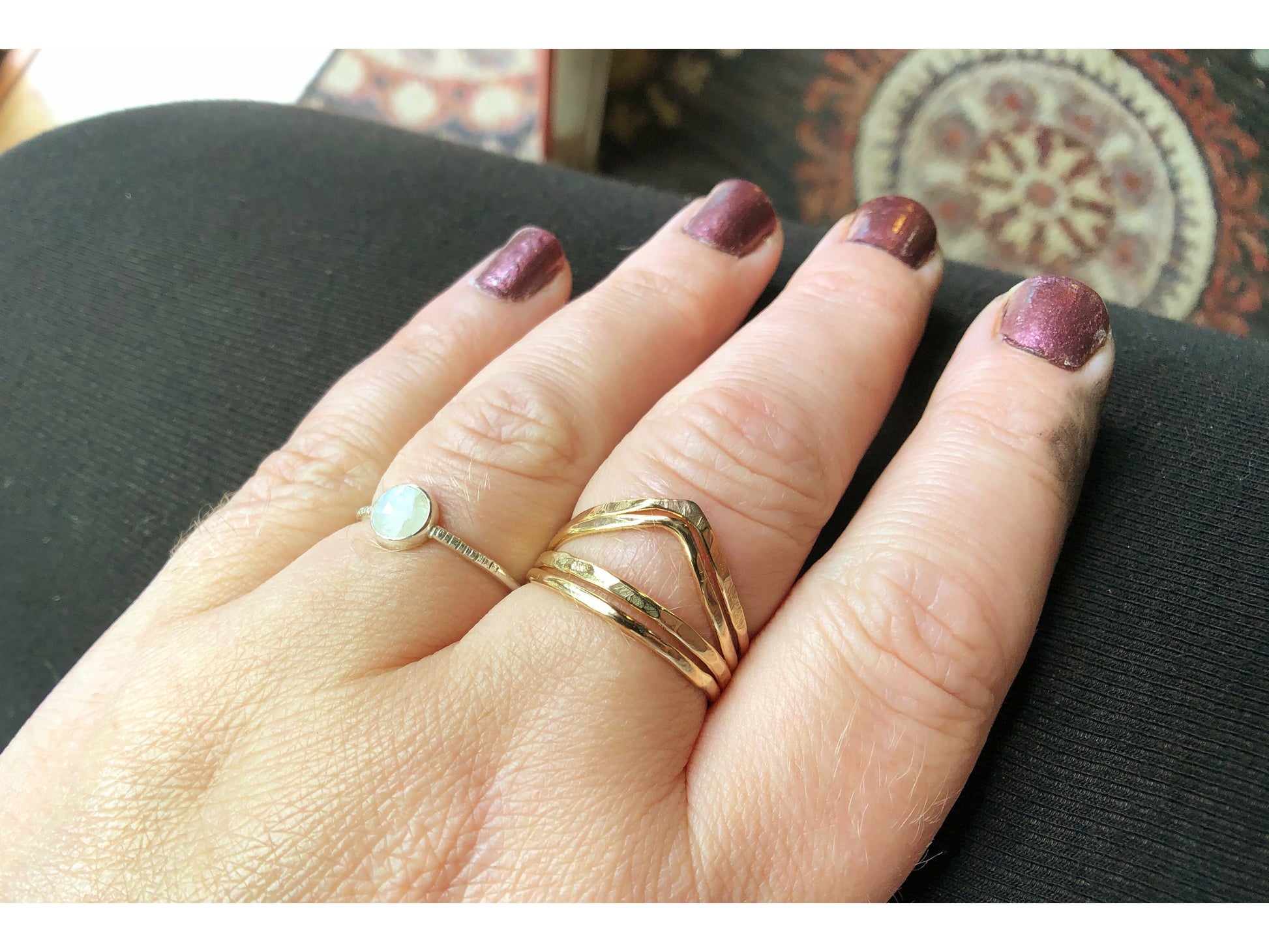 small gold filled rings with one ring a chevron