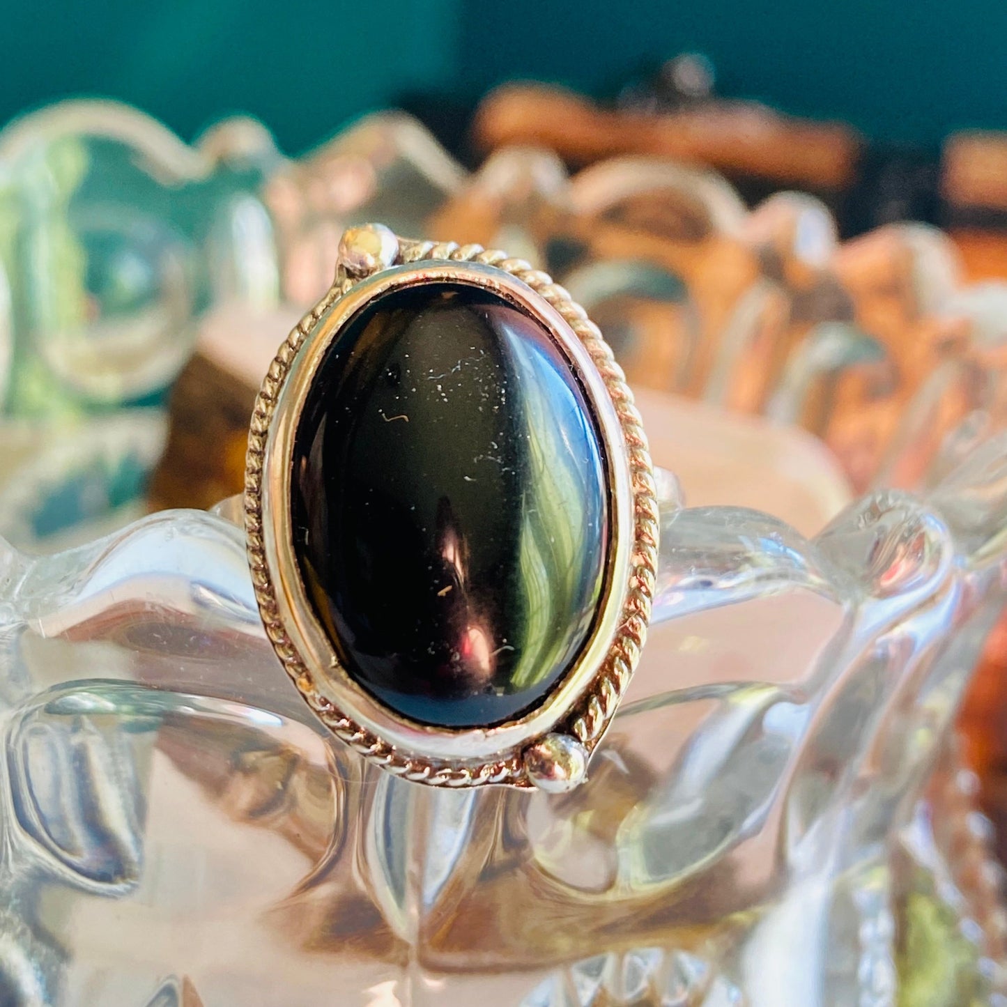 sterling silver onyx statement ring, onyx cabachon with half twisted wire with granulation (tiny dots) offset, statement ring, simple band