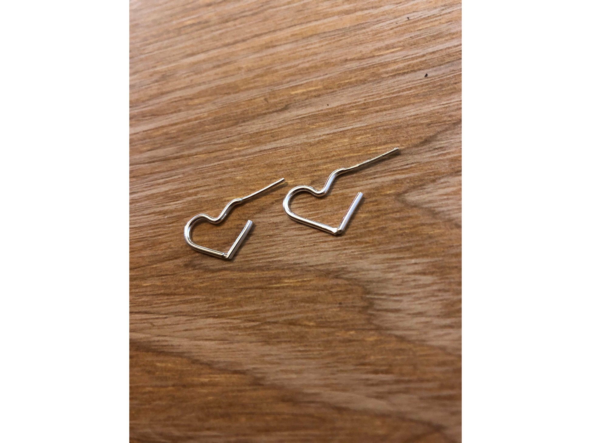 silver wire makes a heart shape