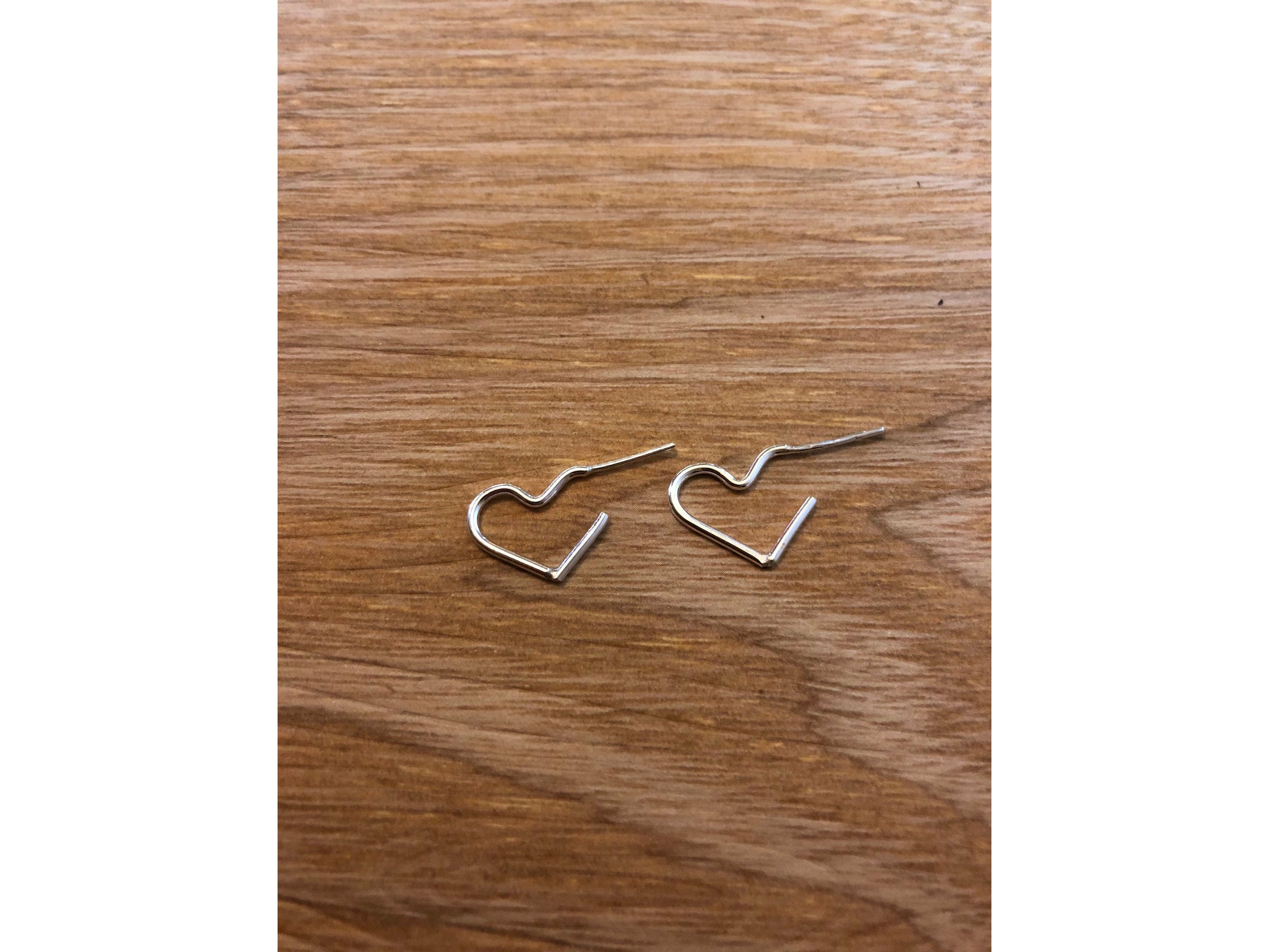 silver wire makes a heart shape